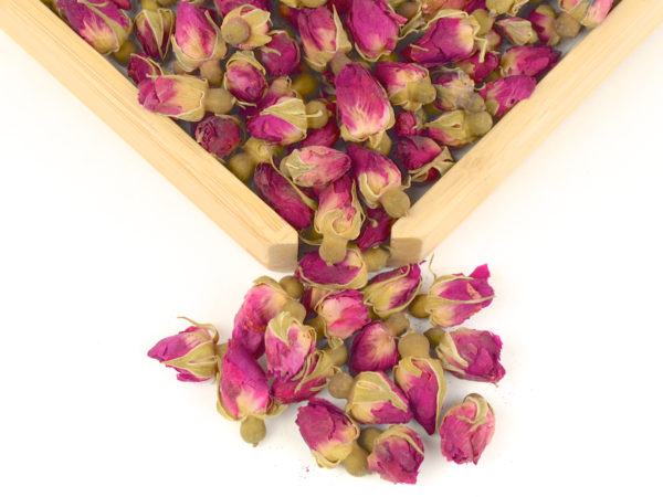 Rose Buds dry herbal tea in a wooden display box.