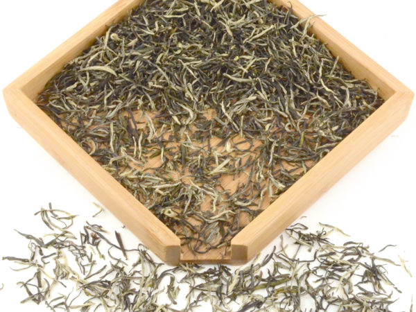Wang Zhe Zhi Xiang (Emperor’s Orchid) scented tea dry leaves in a wooden display box.